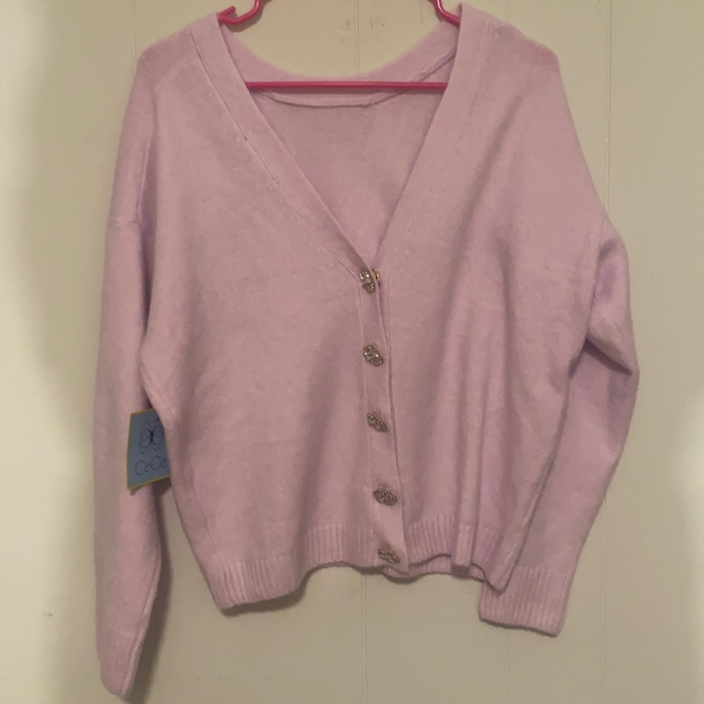 NWT CeCe lavender sweater crew 5 sparkly  cute buttons in back. Low V-neck back